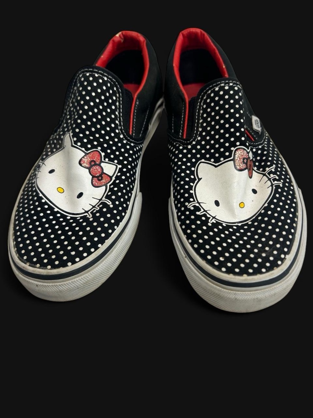 Vans Black Polka Dot Hello Kitty Slip-On Sneakers with Red Accents